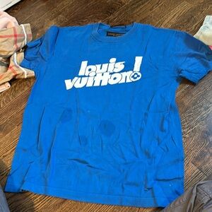 Louis Vuitton blue T-shirt. Currently Spot treating the three small stains.